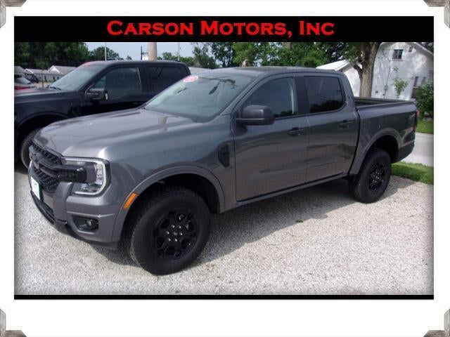 2025 Ford Ranger XLT in Carb Gray — front three-quarter view