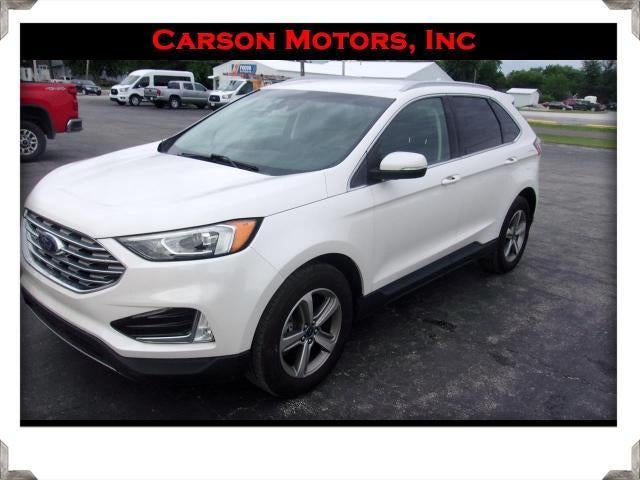 2019 Ford Edge SEL in White — front three-quarter view
