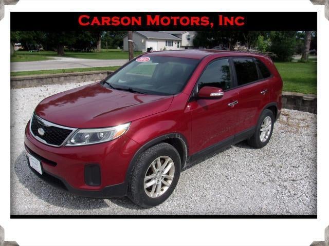 2014 Kia Sorento LX in Maroon — front three-quarter view